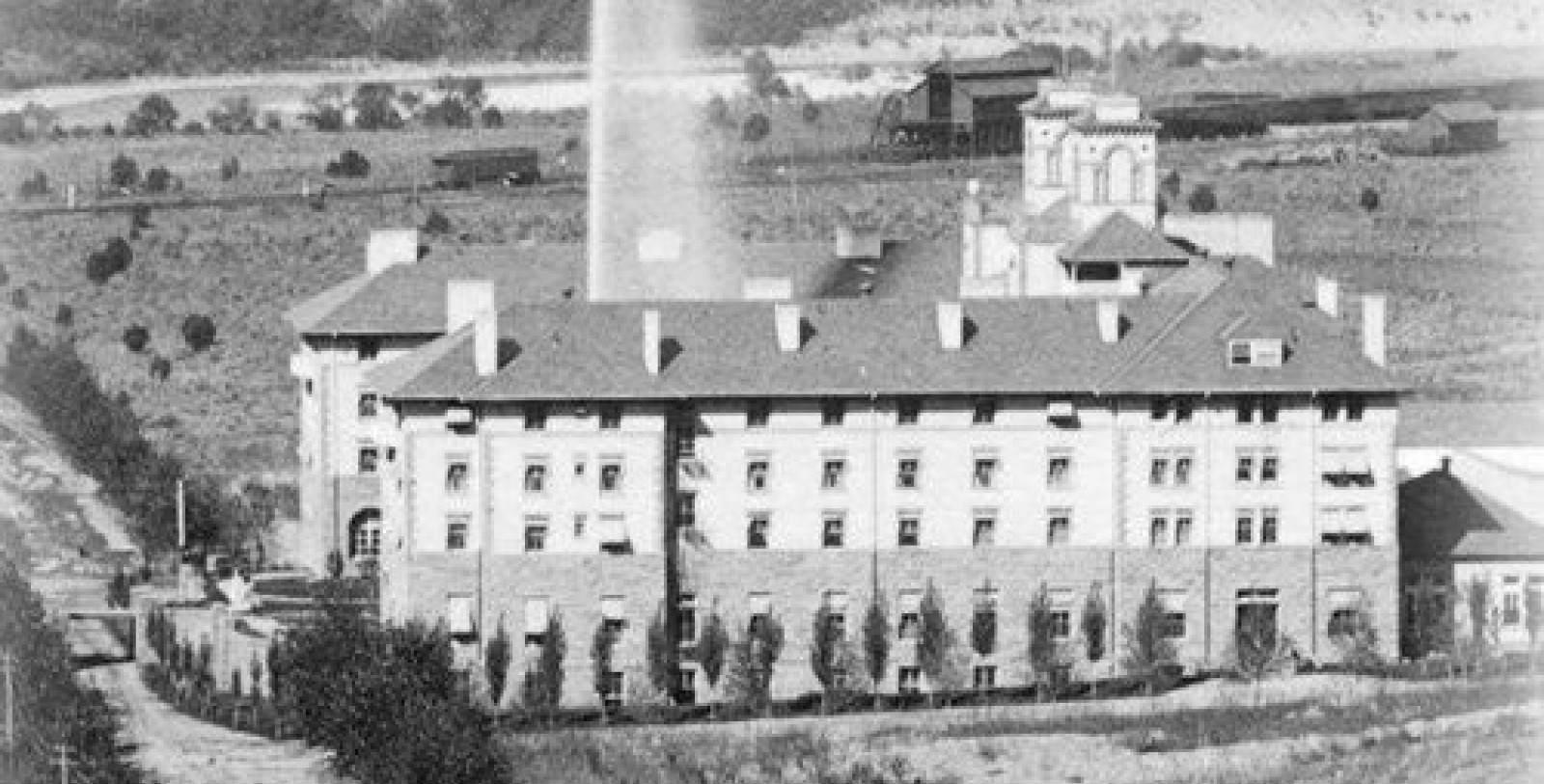 a building with a tall chimney