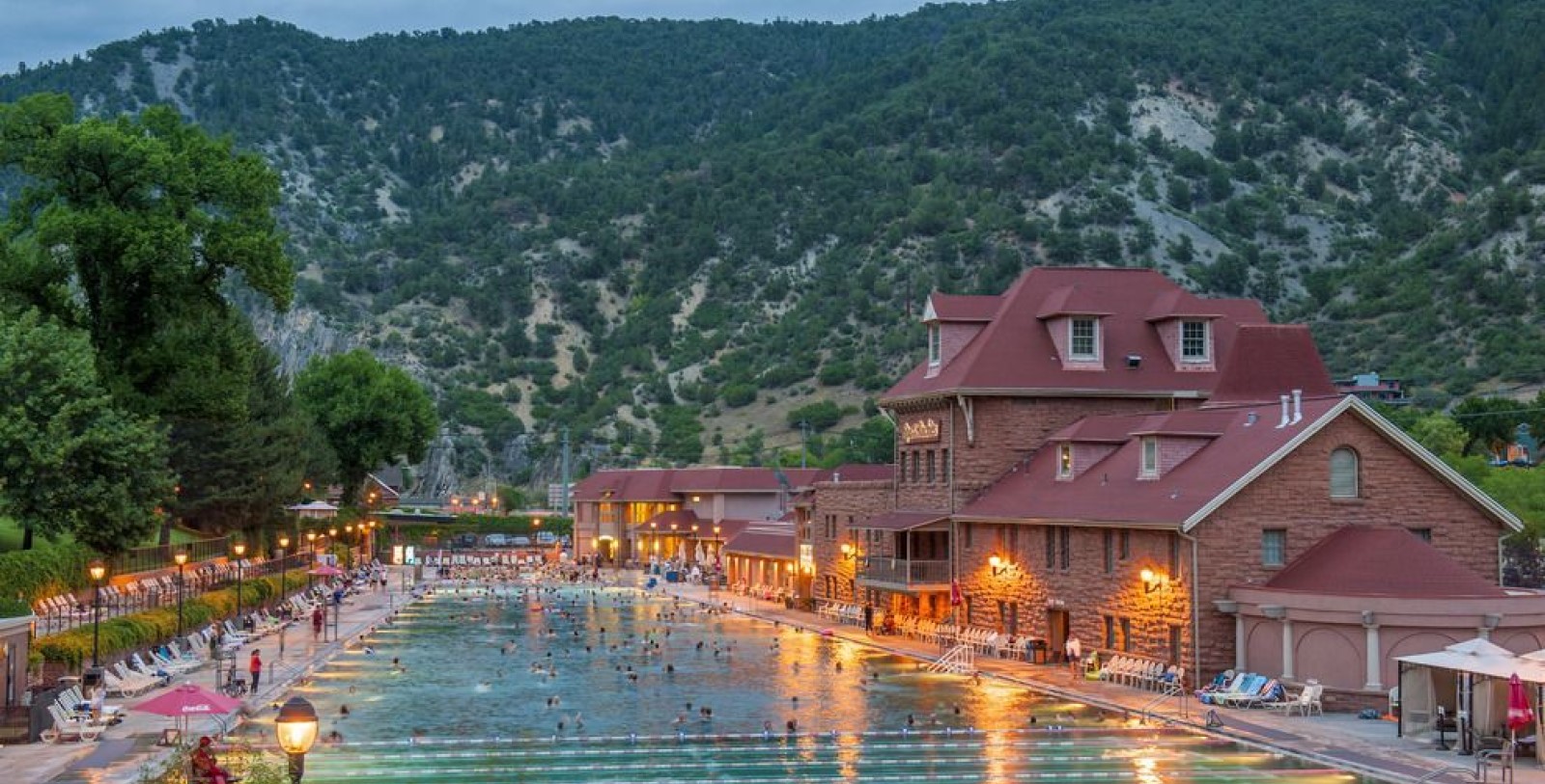 a large pool with people swimming in it