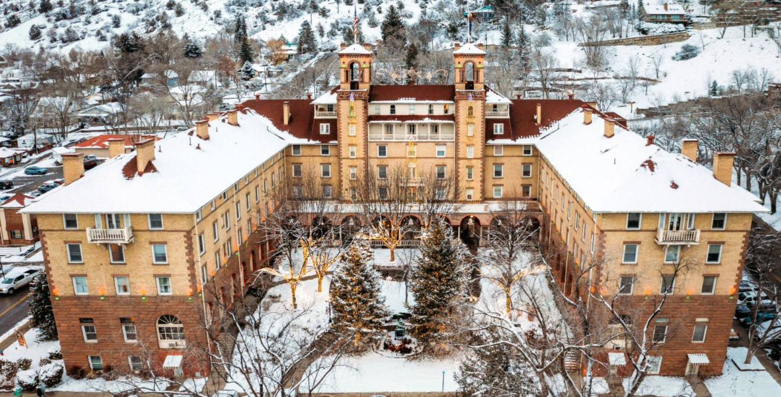 a building with a snow covered courtyard
