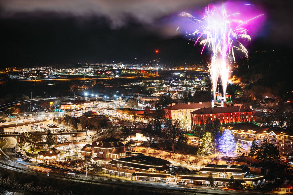 fireworks in the sky above a town