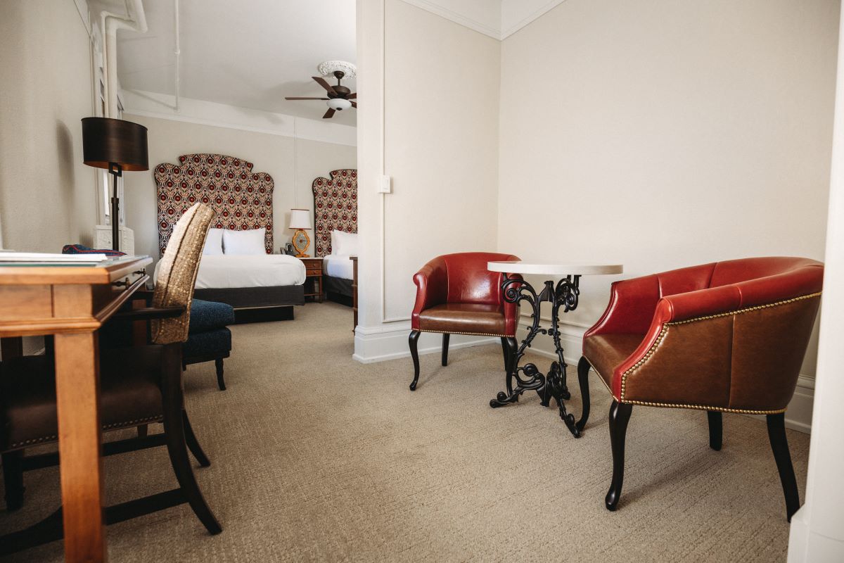 a room with chairs and a table