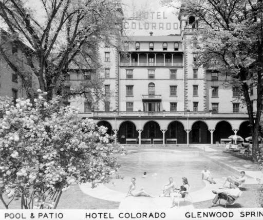 a black and white photo of a hotel