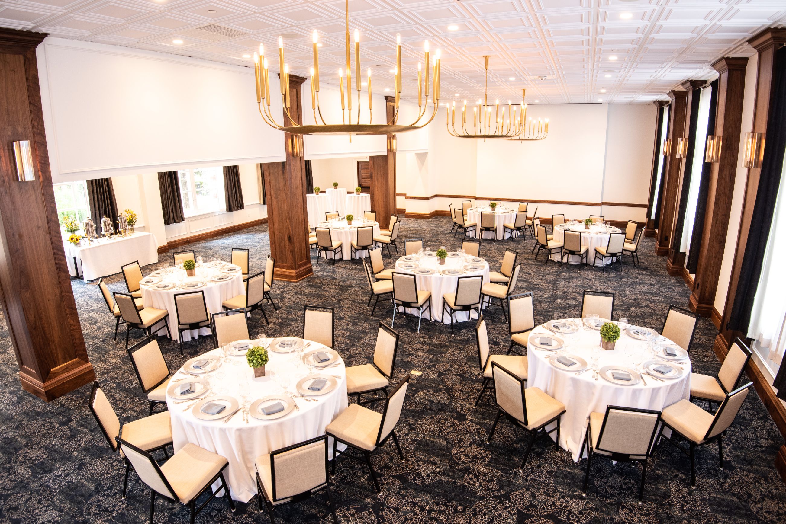 a large room with tables and chairs