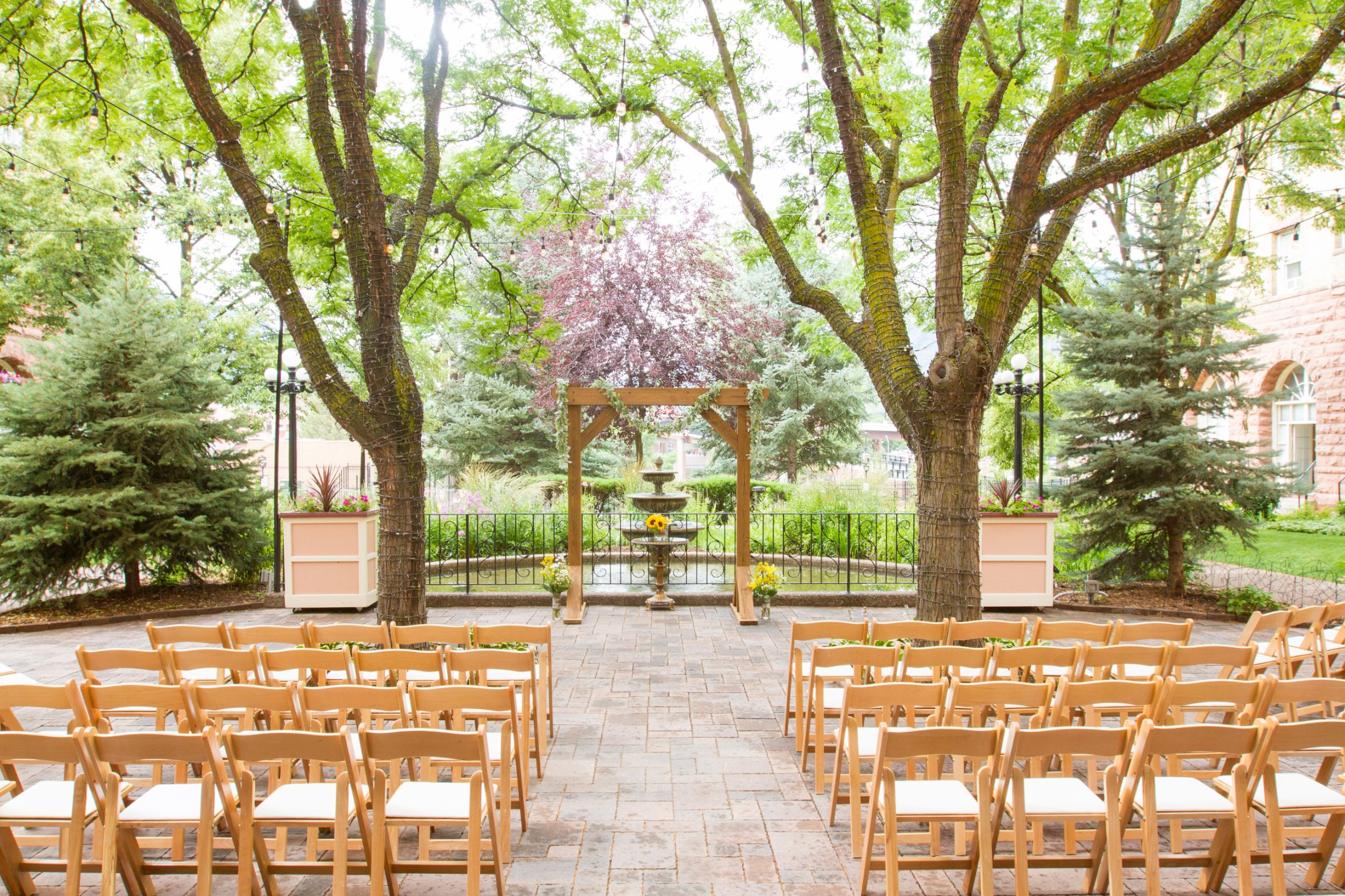 a group of chairs in a courtyard