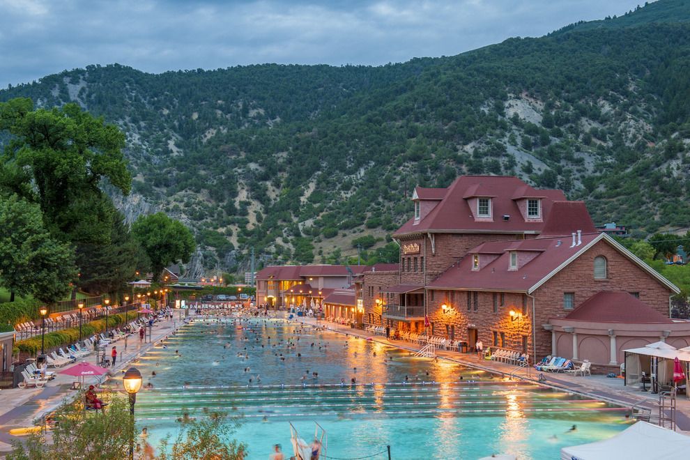 a large pool with people swimming in it