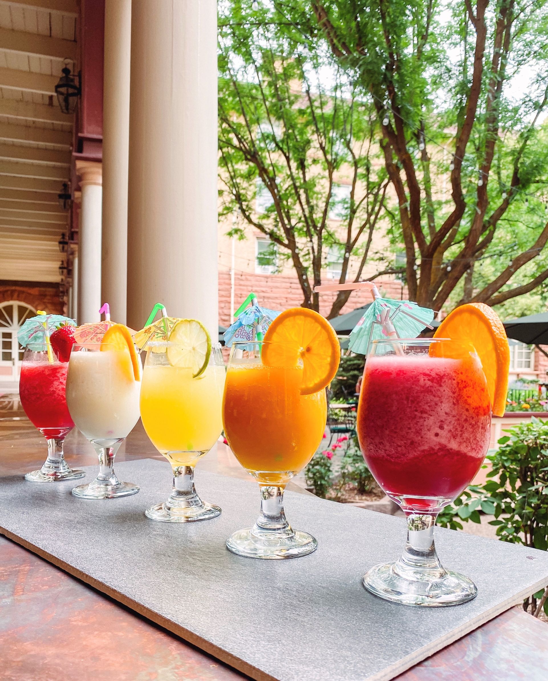 a row of drinks on a table