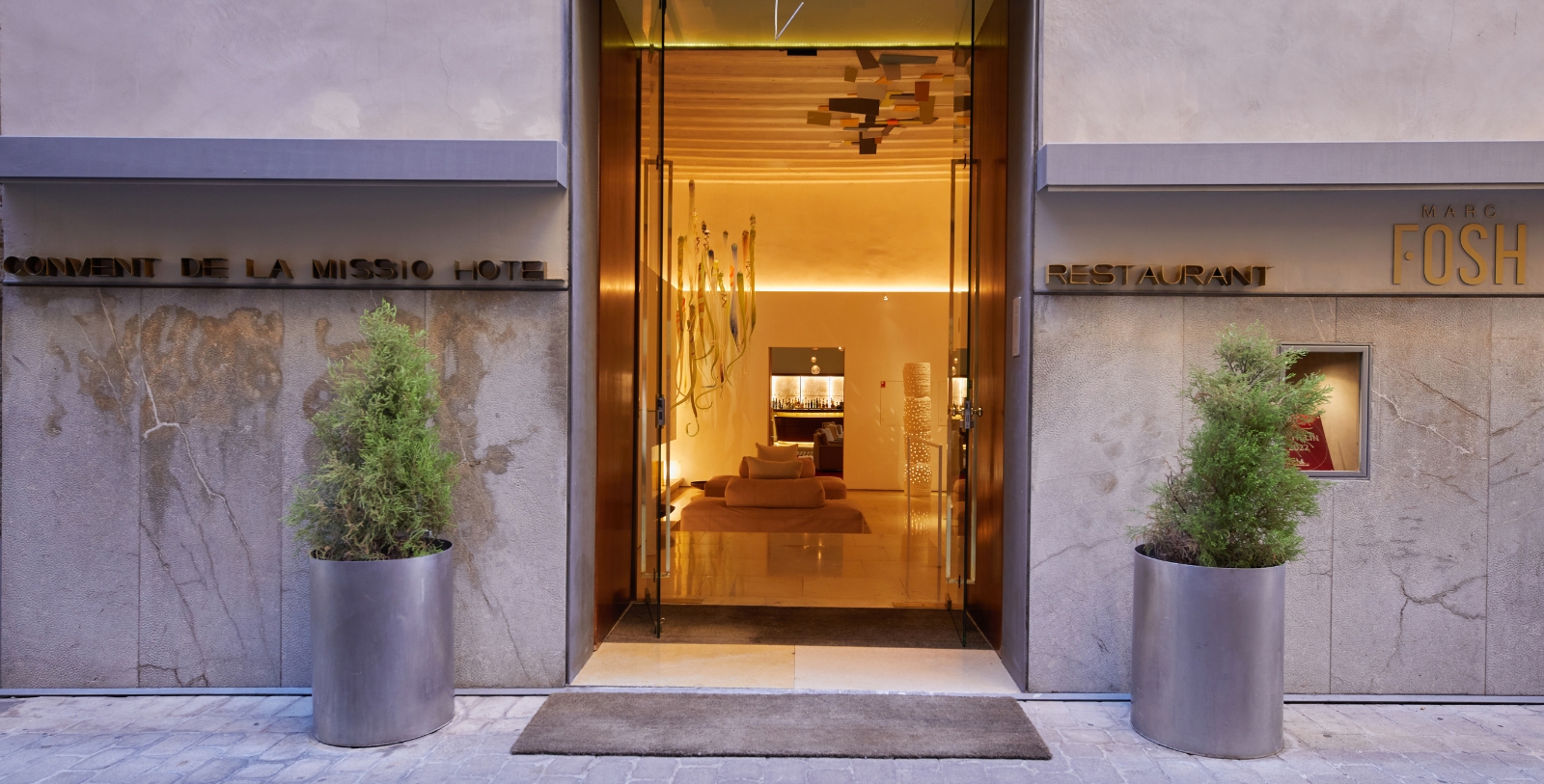 a glass door of a hotel