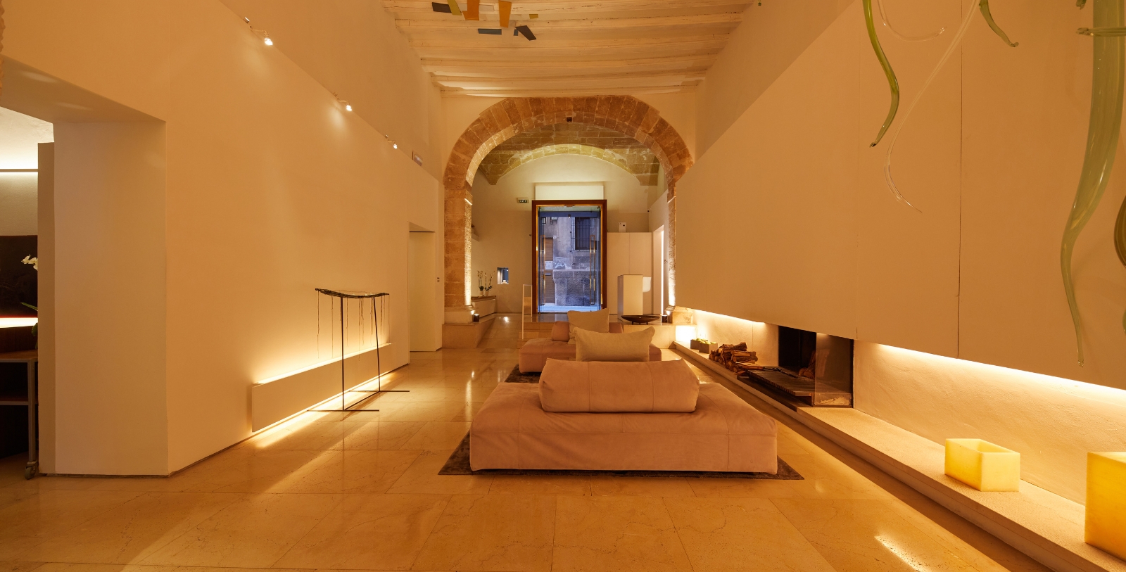 a room with a fireplace and a couch