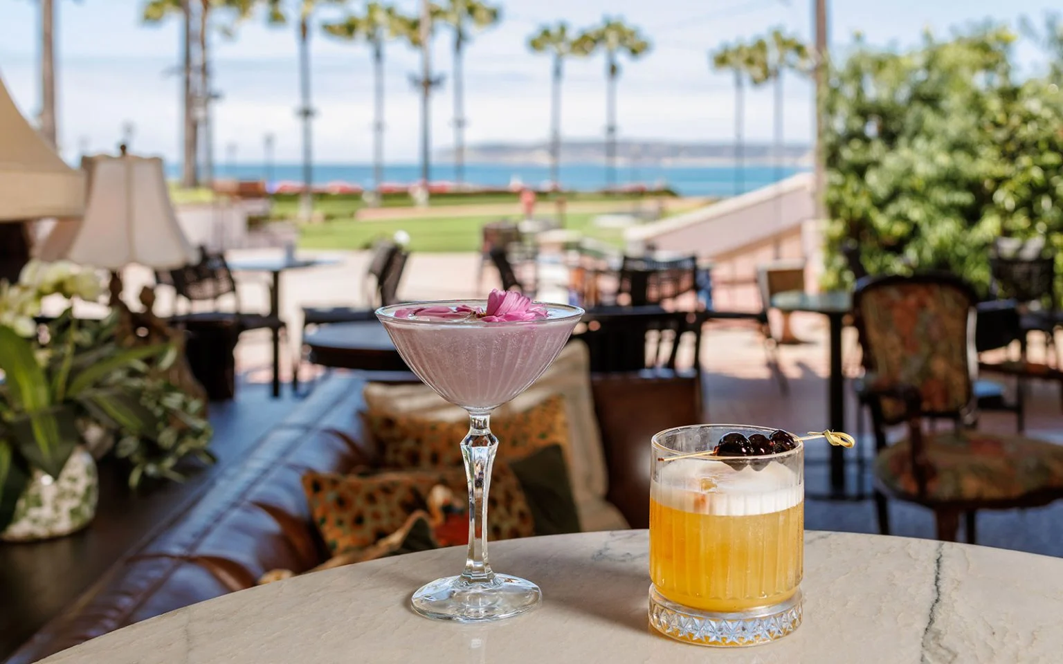 a glass of drink on a table