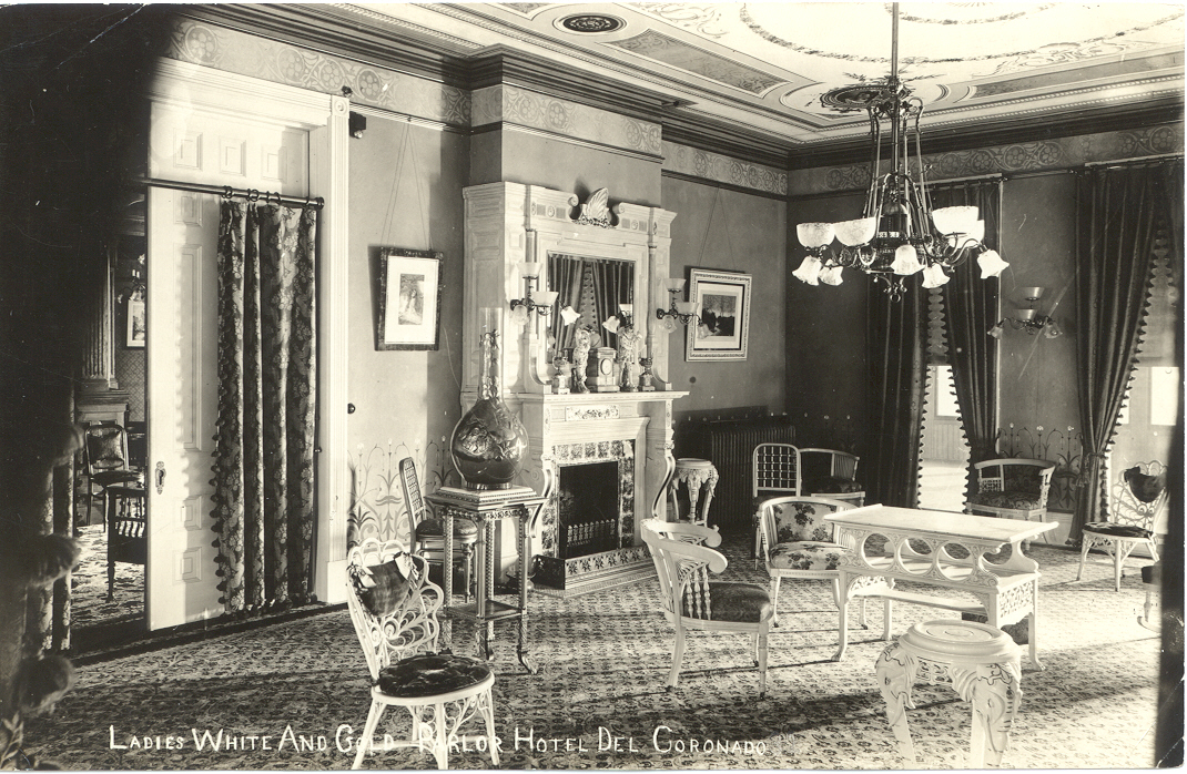 a room with a fireplace and chairs
