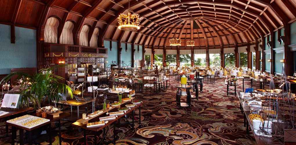 a large room with many tables and food on it