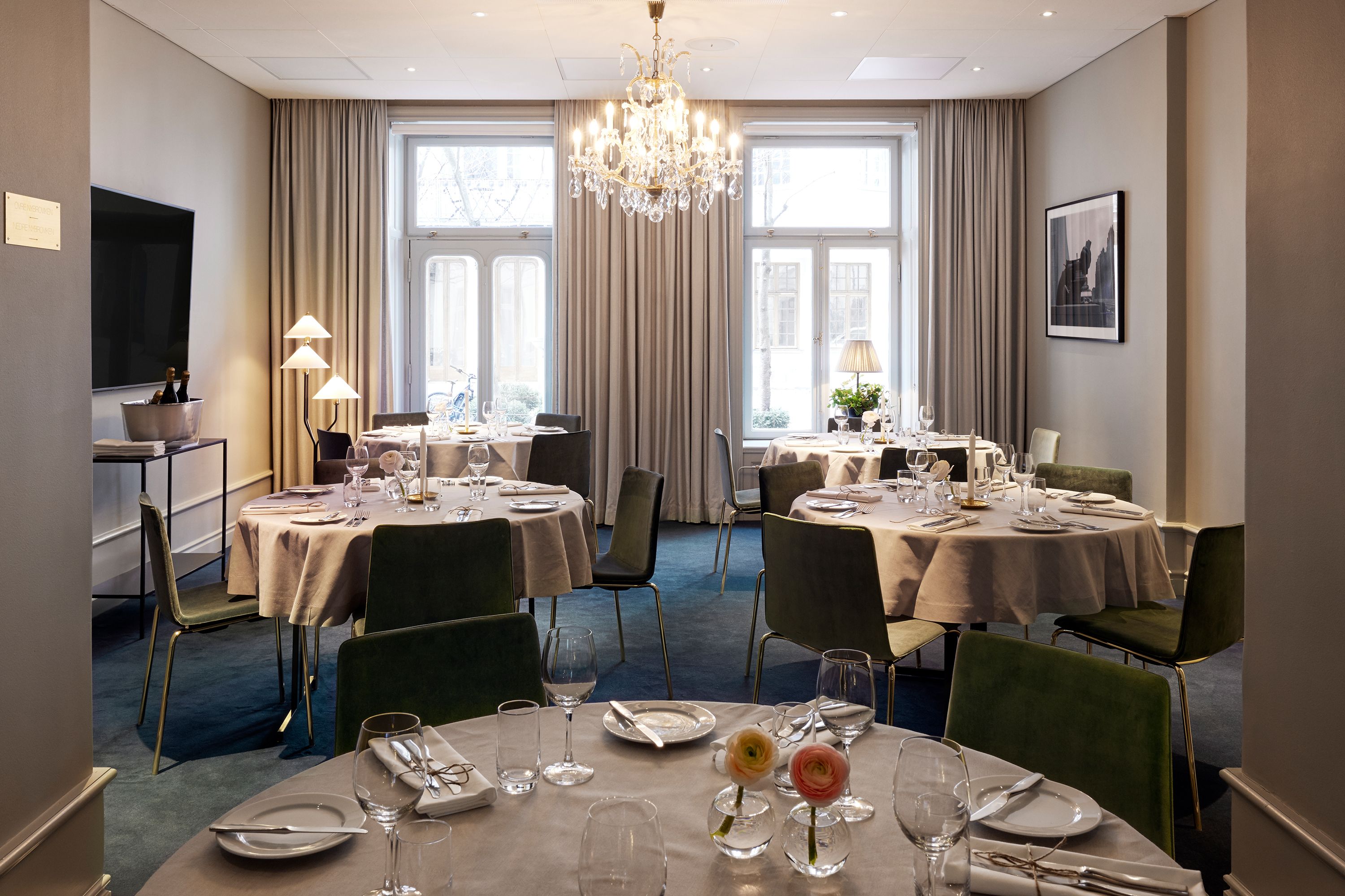 a room with tables and chairs