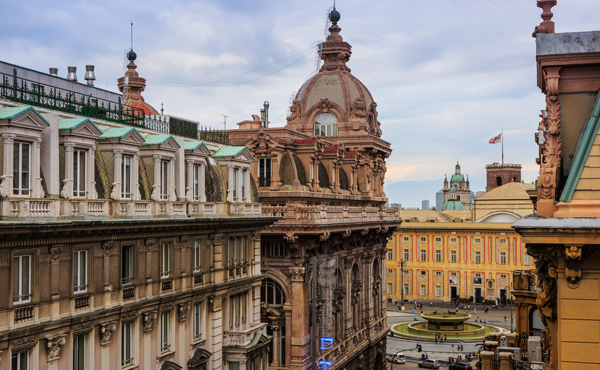 a large building with a fountain in the middle