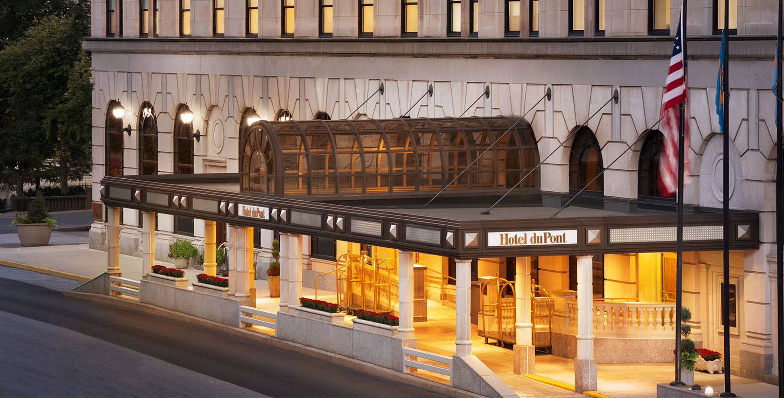 a hotel entrance with glass roof