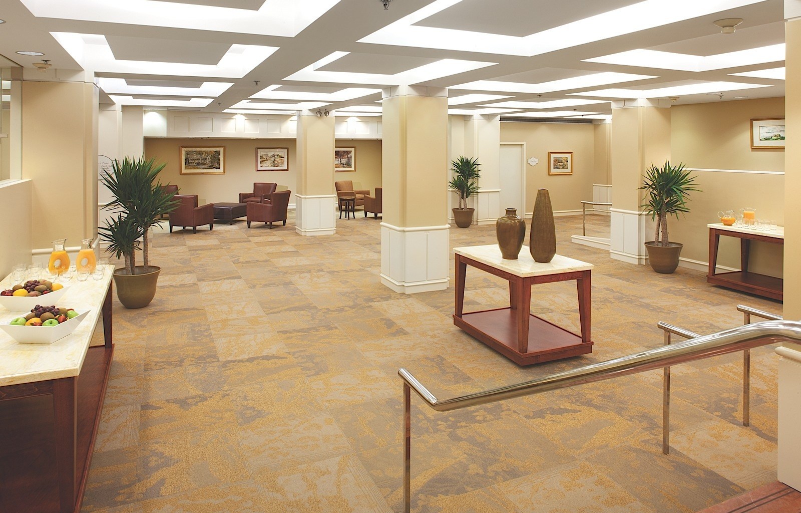 a room with a large table and chairs