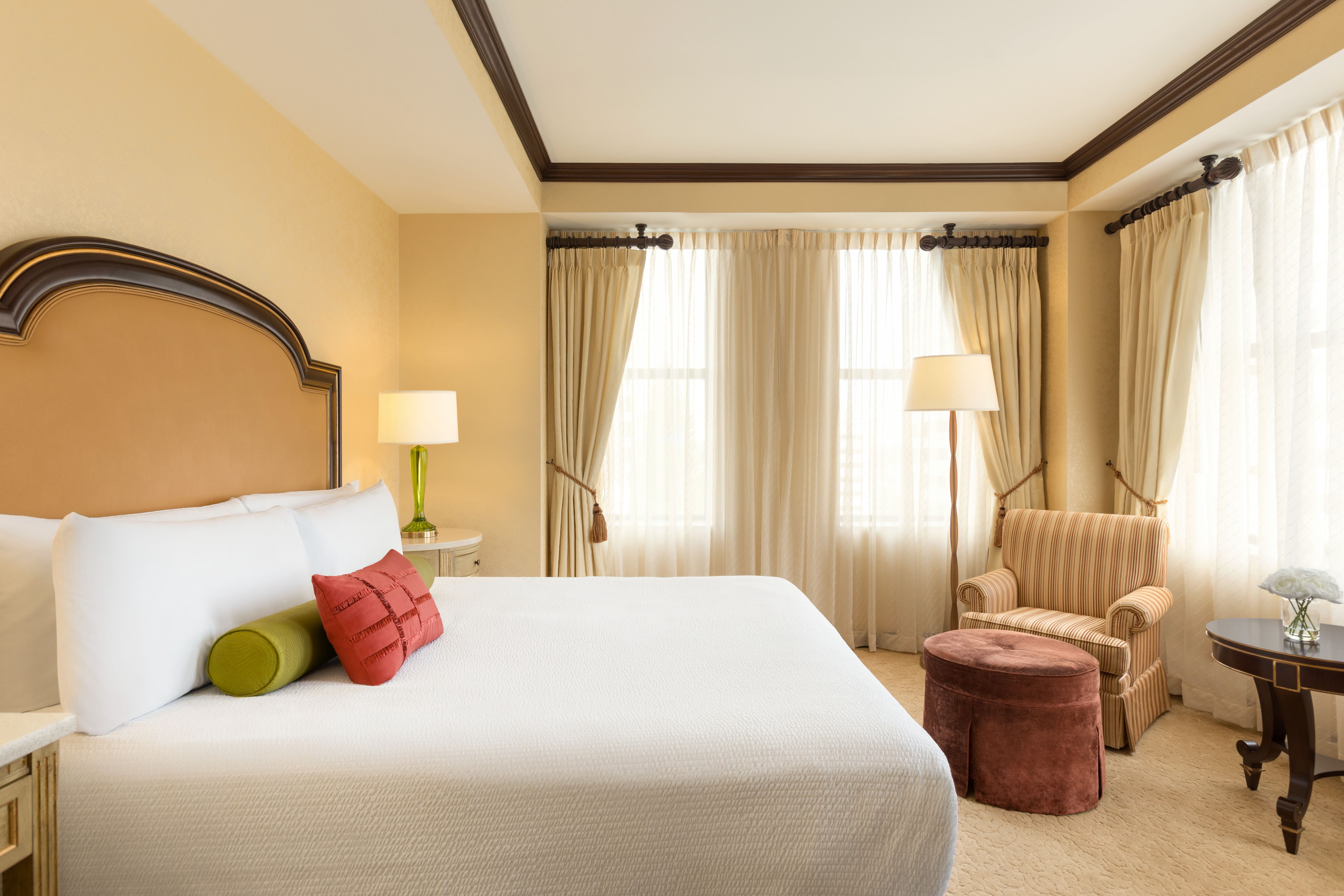 a room with a bed and a chair