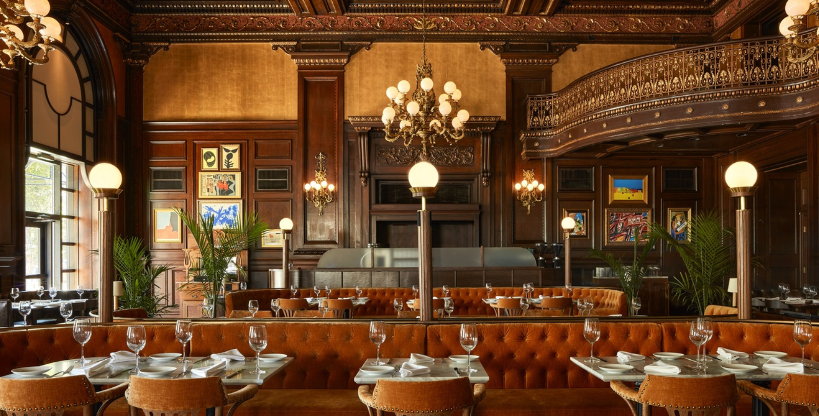 a restaurant with tables and chairs