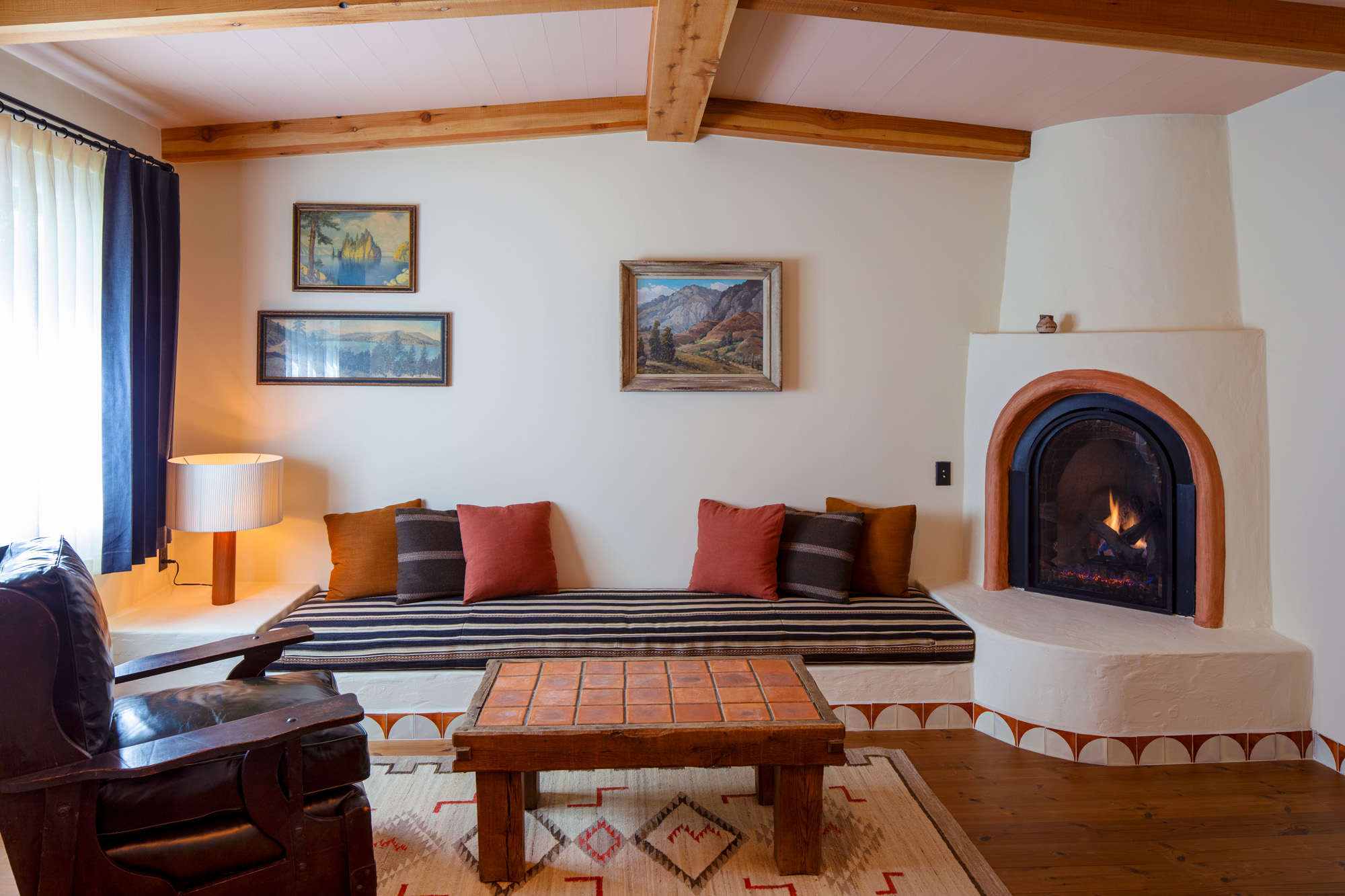a room with a fireplace and a couch