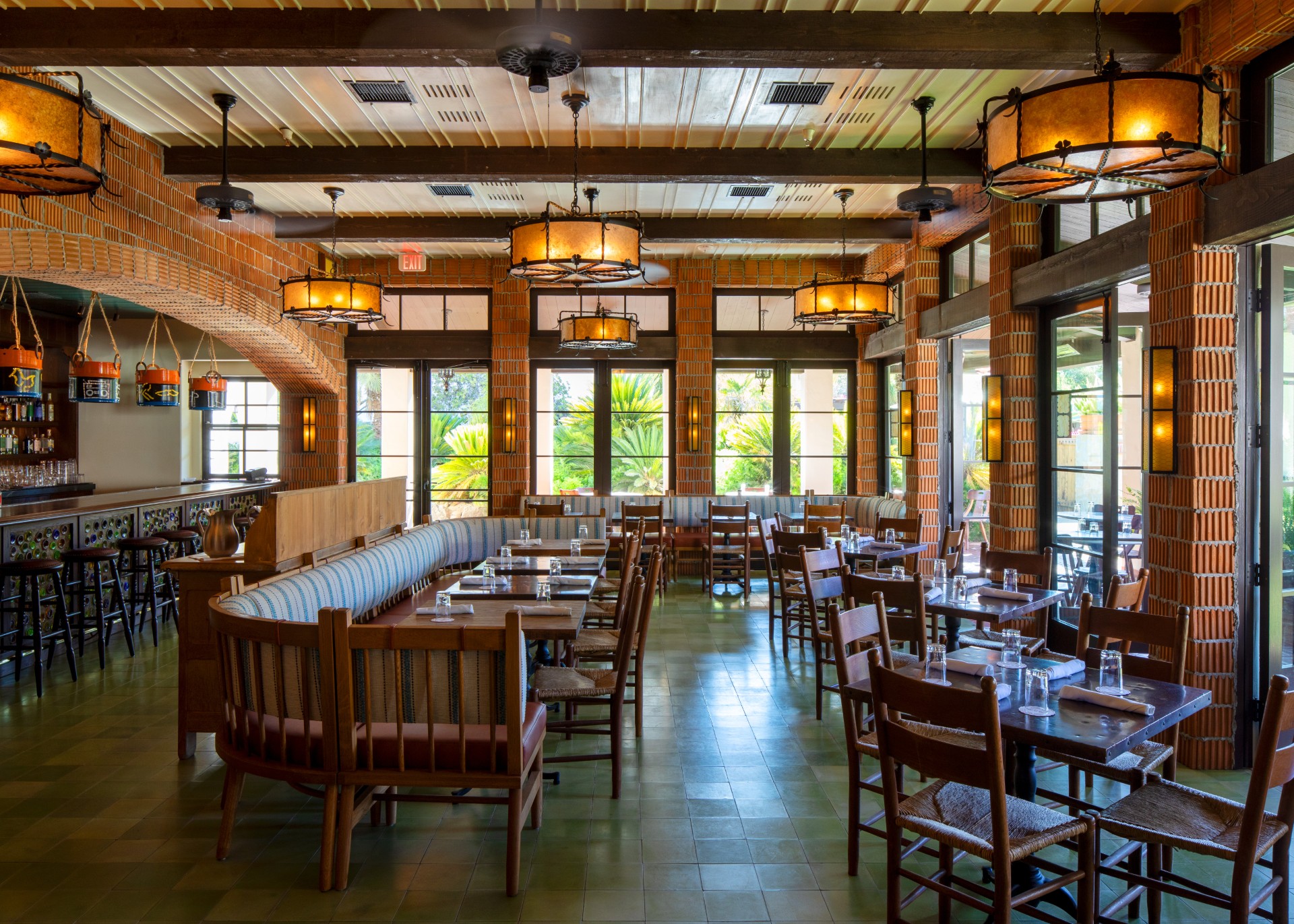 a restaurant with tables and chairs