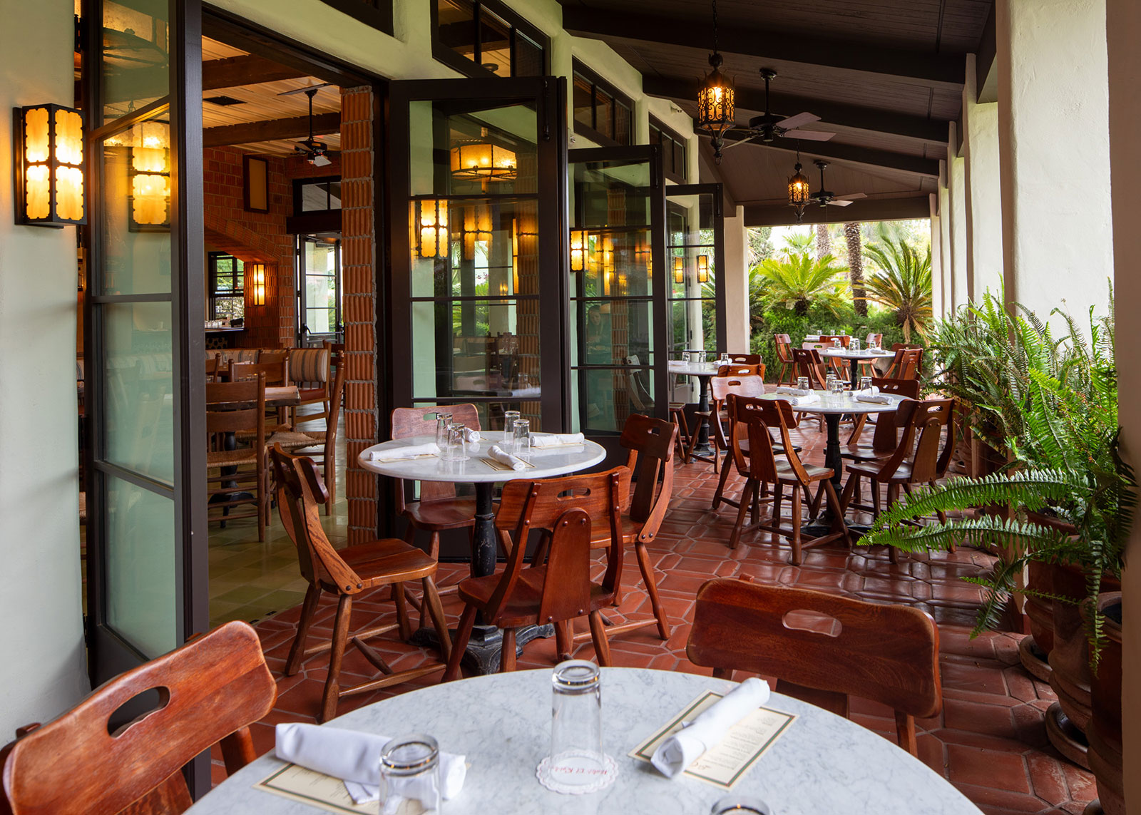 a restaurant with tables and chairs