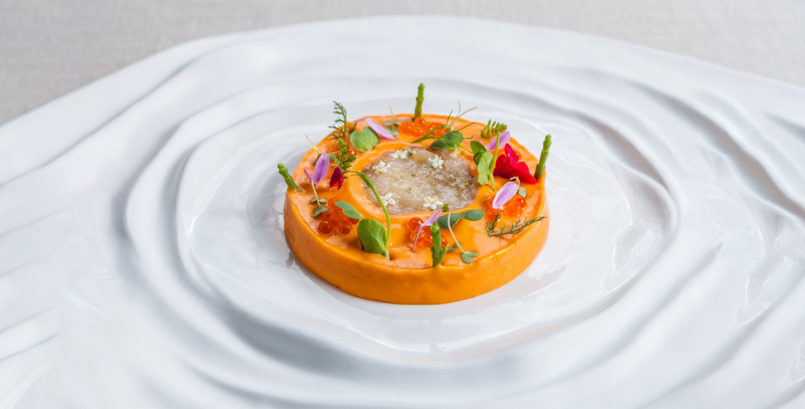 a plate of food on a white surface