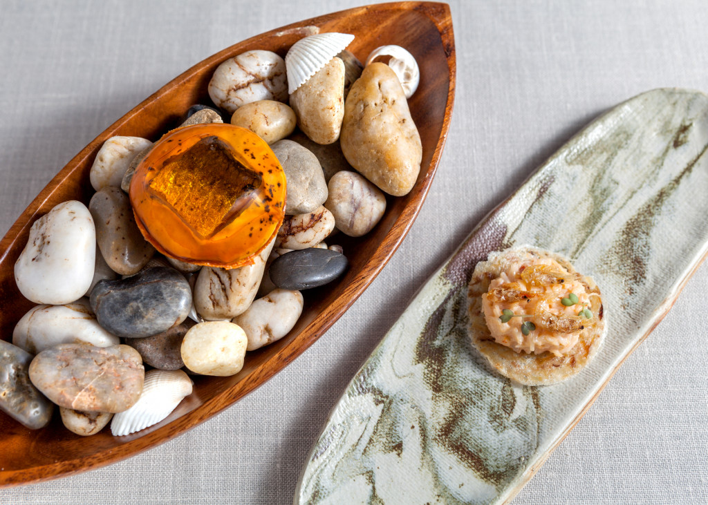 a bowl of rocks and shells