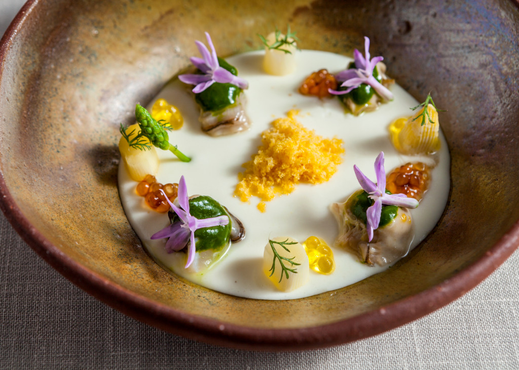a bowl of food with flowers