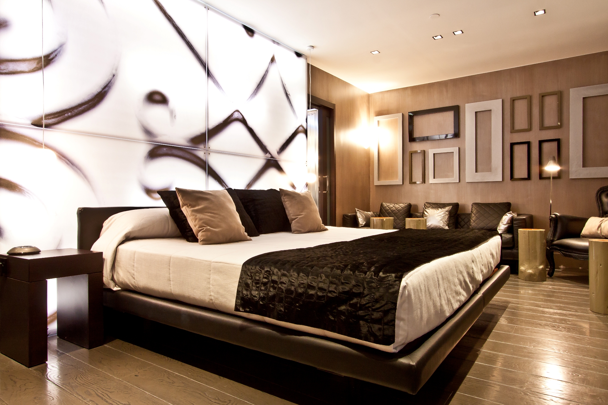a bed with pillows in a room