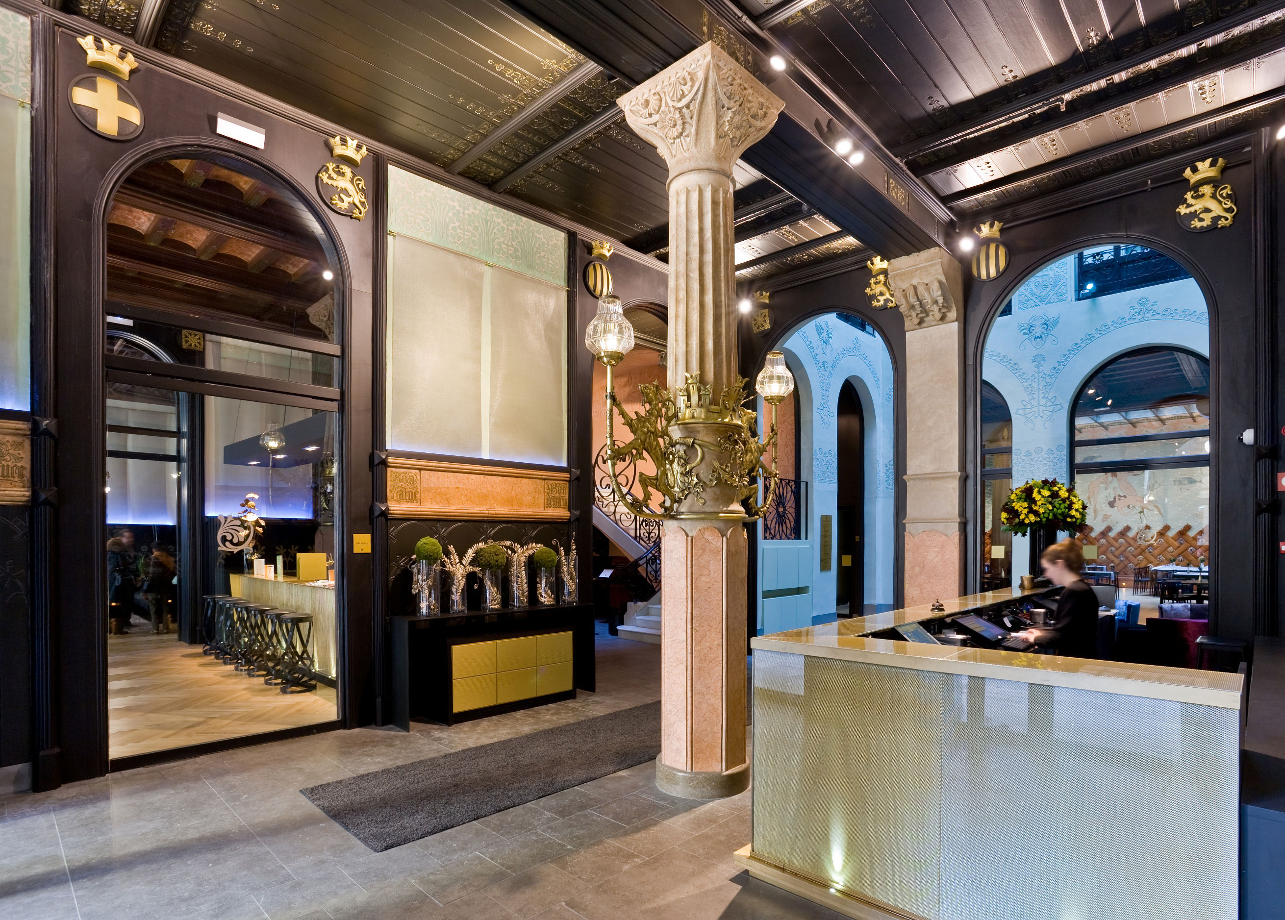 a lobby with a column and a counter
