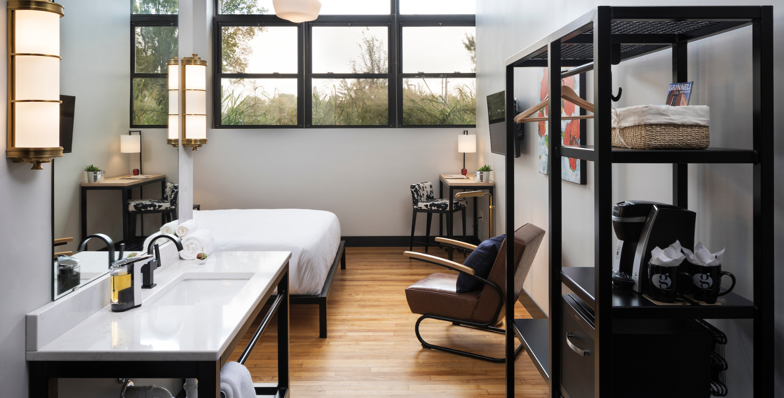 a room with a bed and a desk