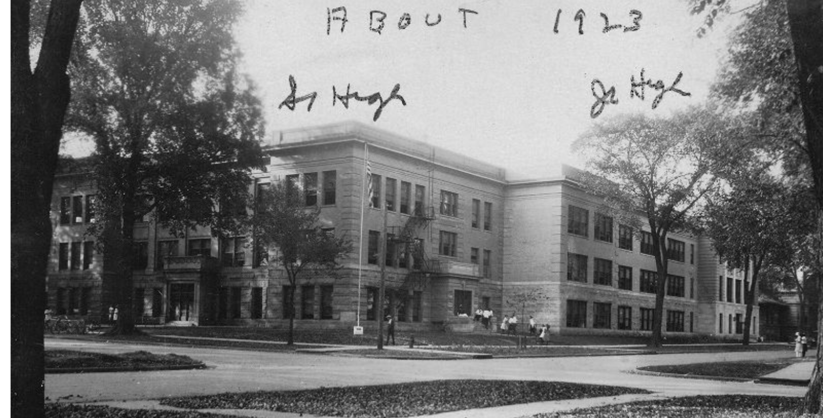 a building with a flag on the front