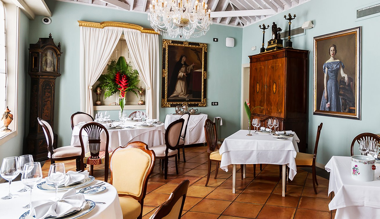 a room with tables and chairs