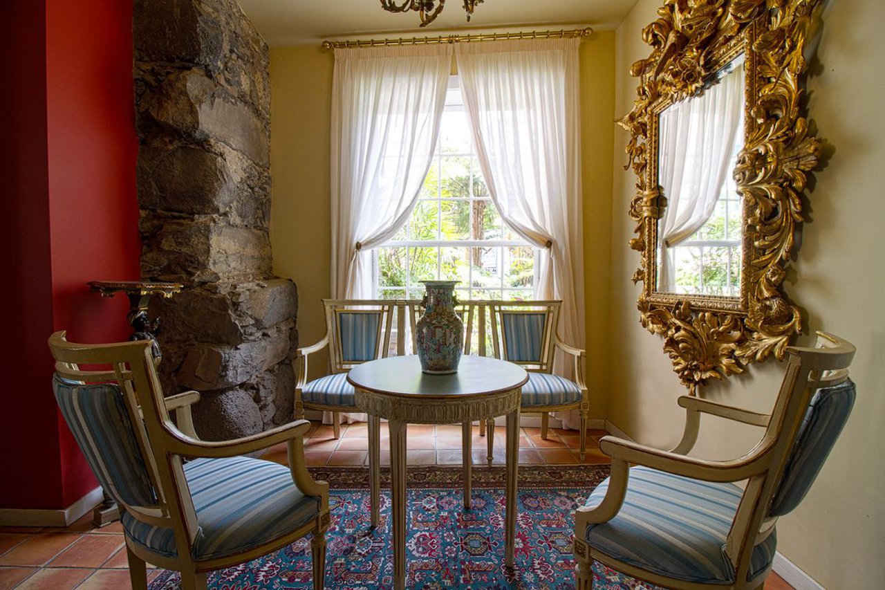 a room with a table and chairs