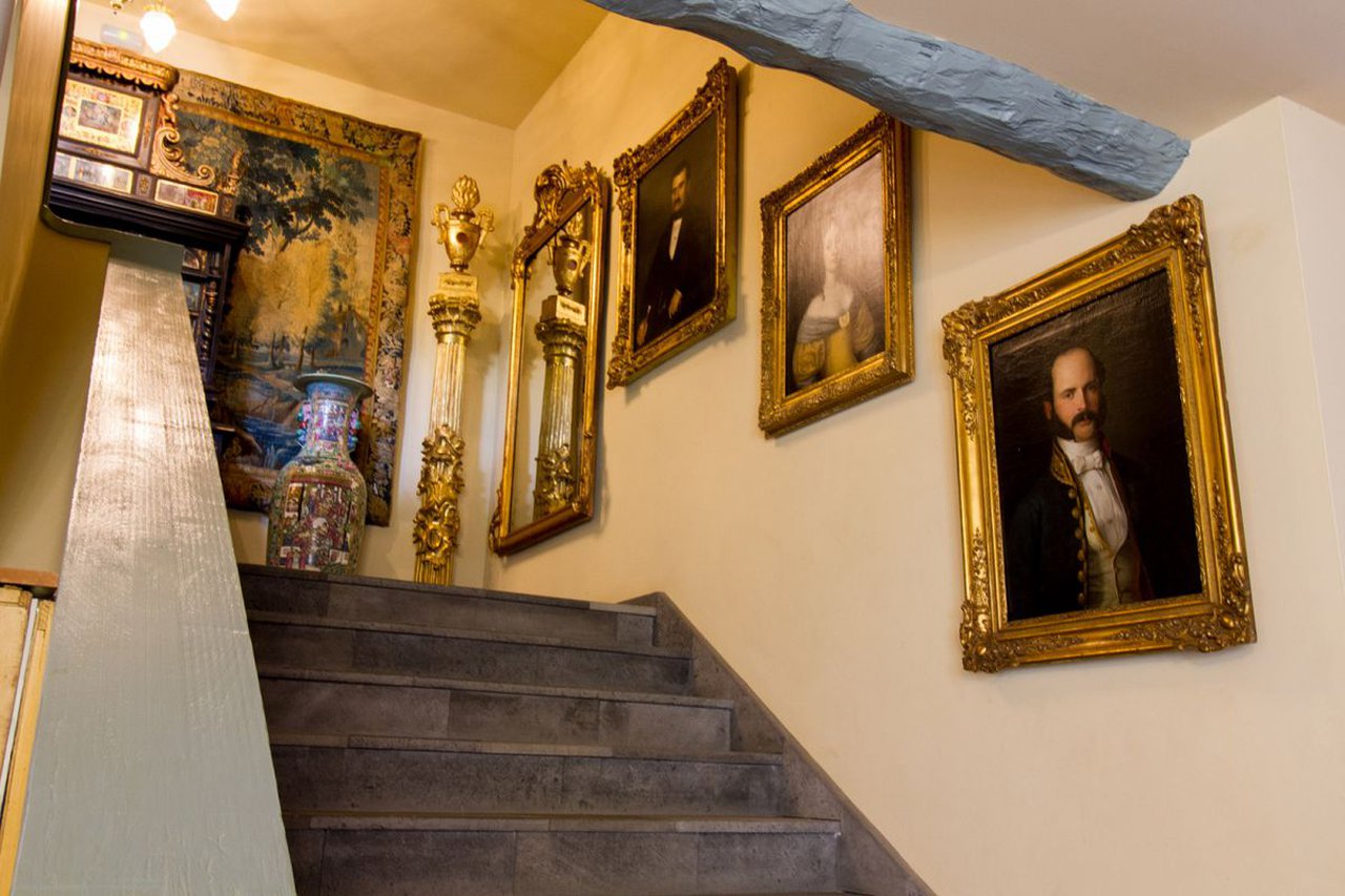 a staircase with a set of pictures on it