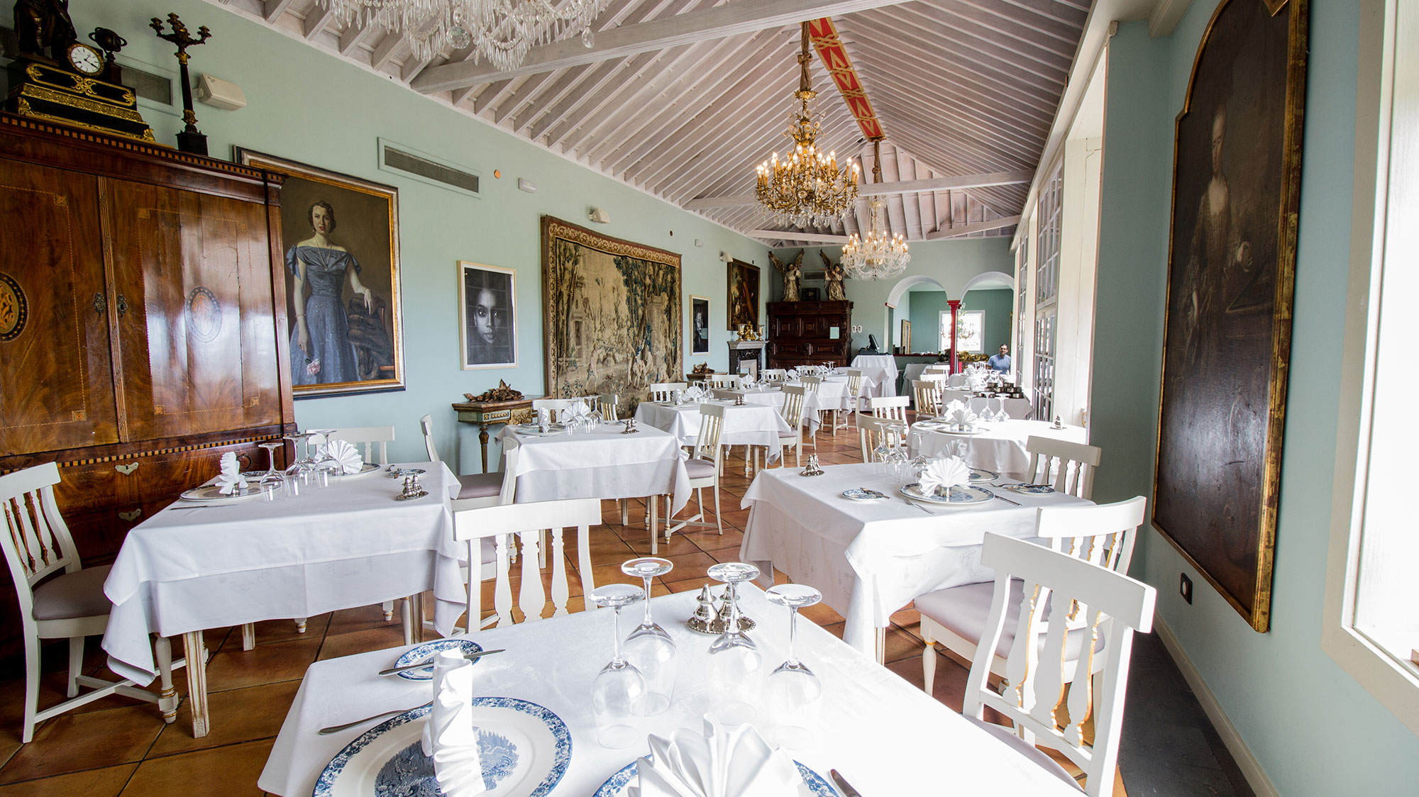 a room with tables and chairs