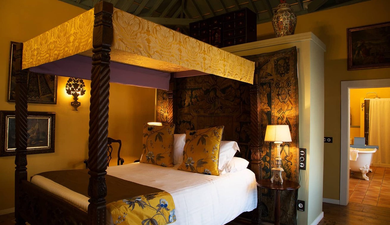 a bed with a canopy over it