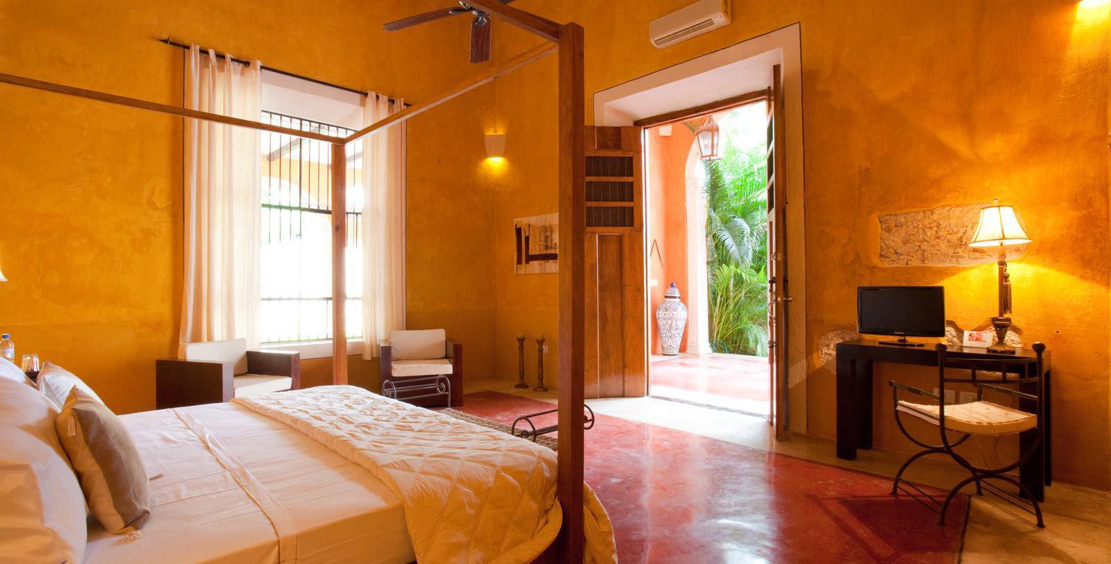 a bedroom with a bed and a chair