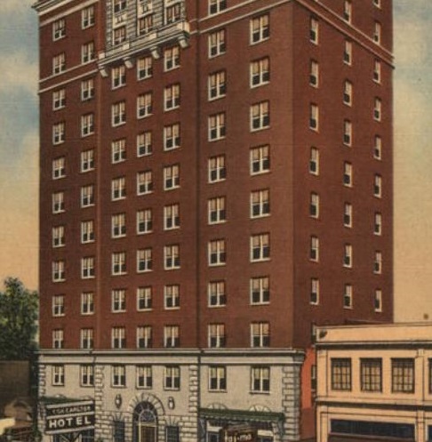 a large building with a clock on the front