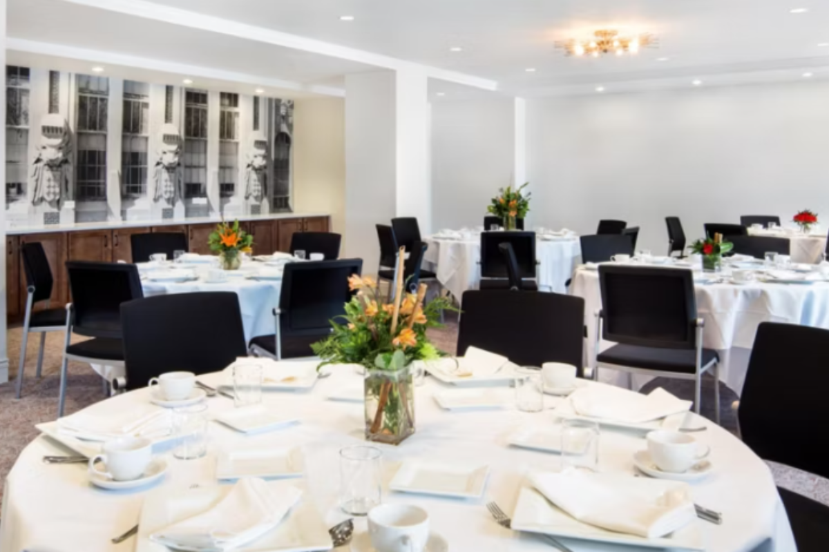 a room with tables and chairs