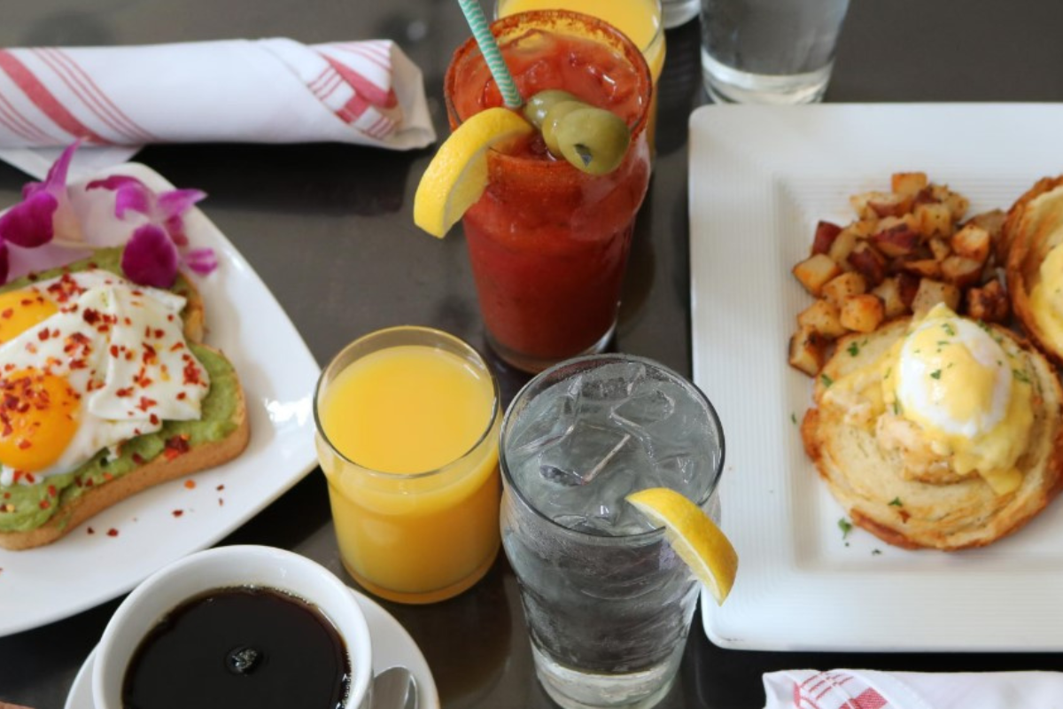 a table with drinks and food