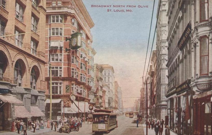 a city street with people walking on the street