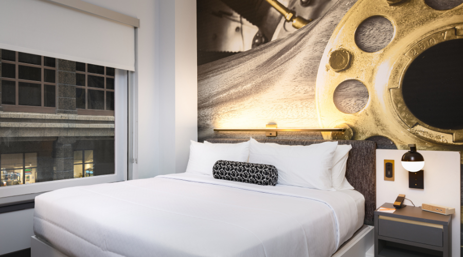 a bed with a pillow on it