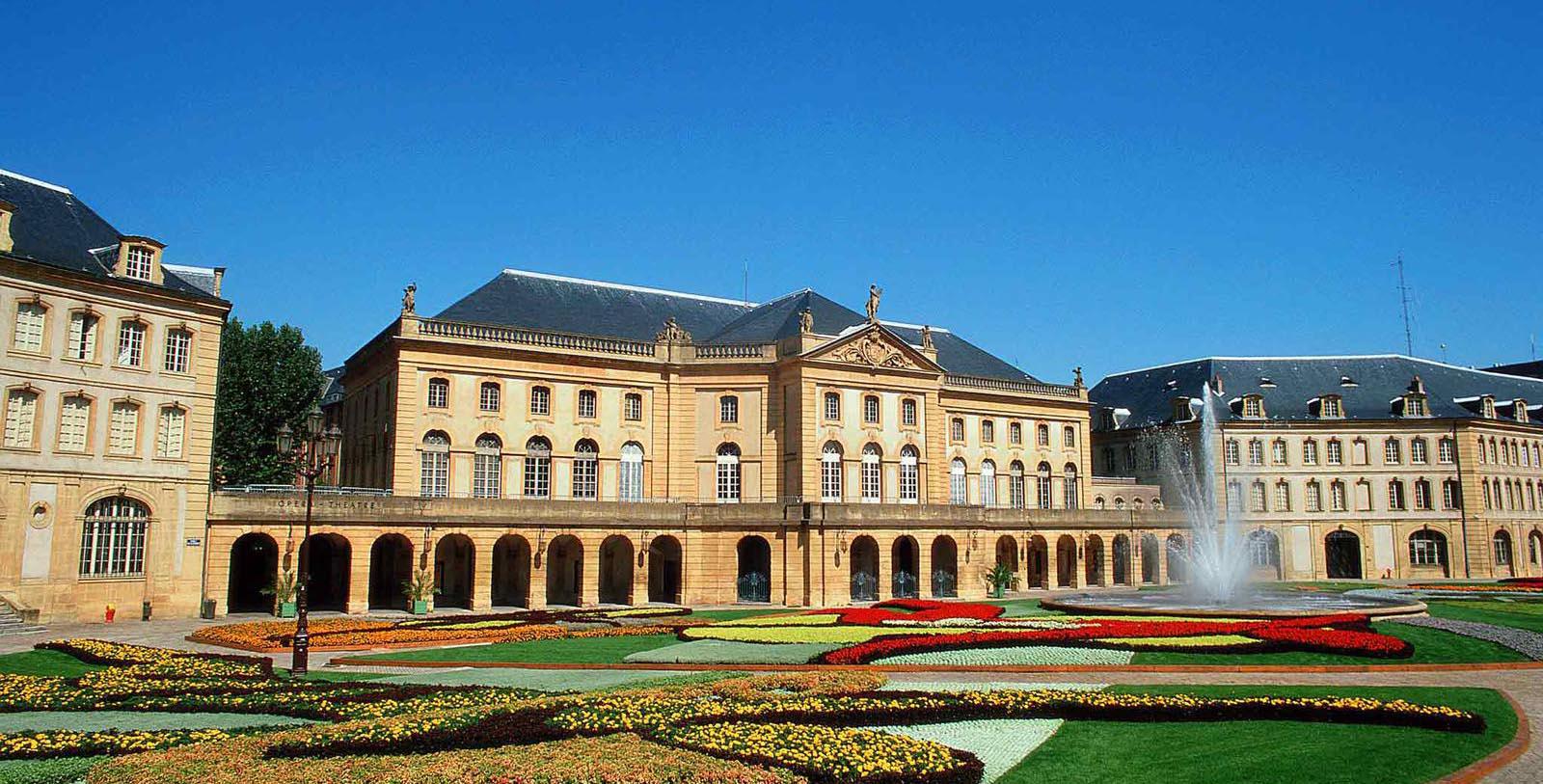 a large building with a garden