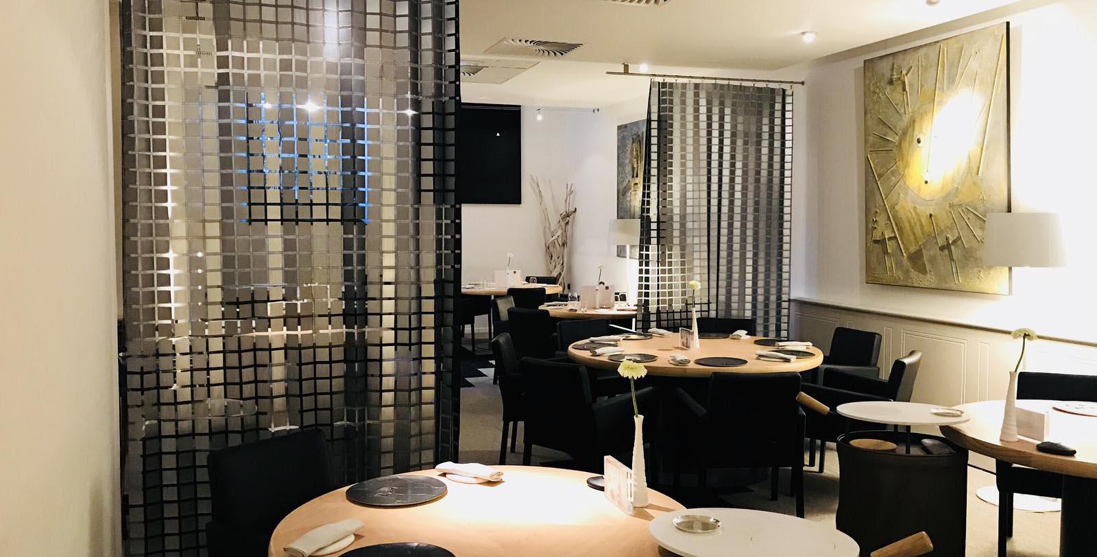 a room with tables and chairs