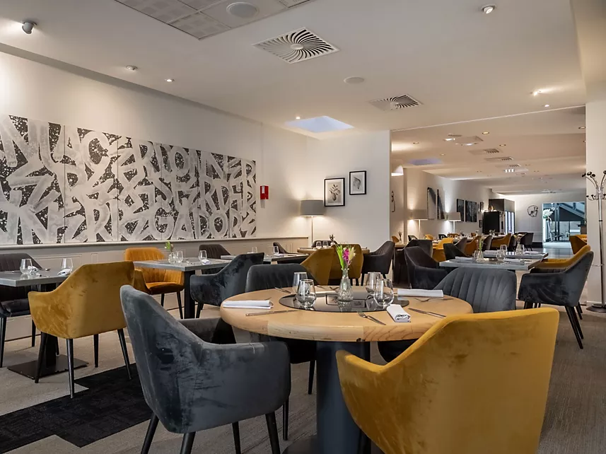 a room with tables and chairs