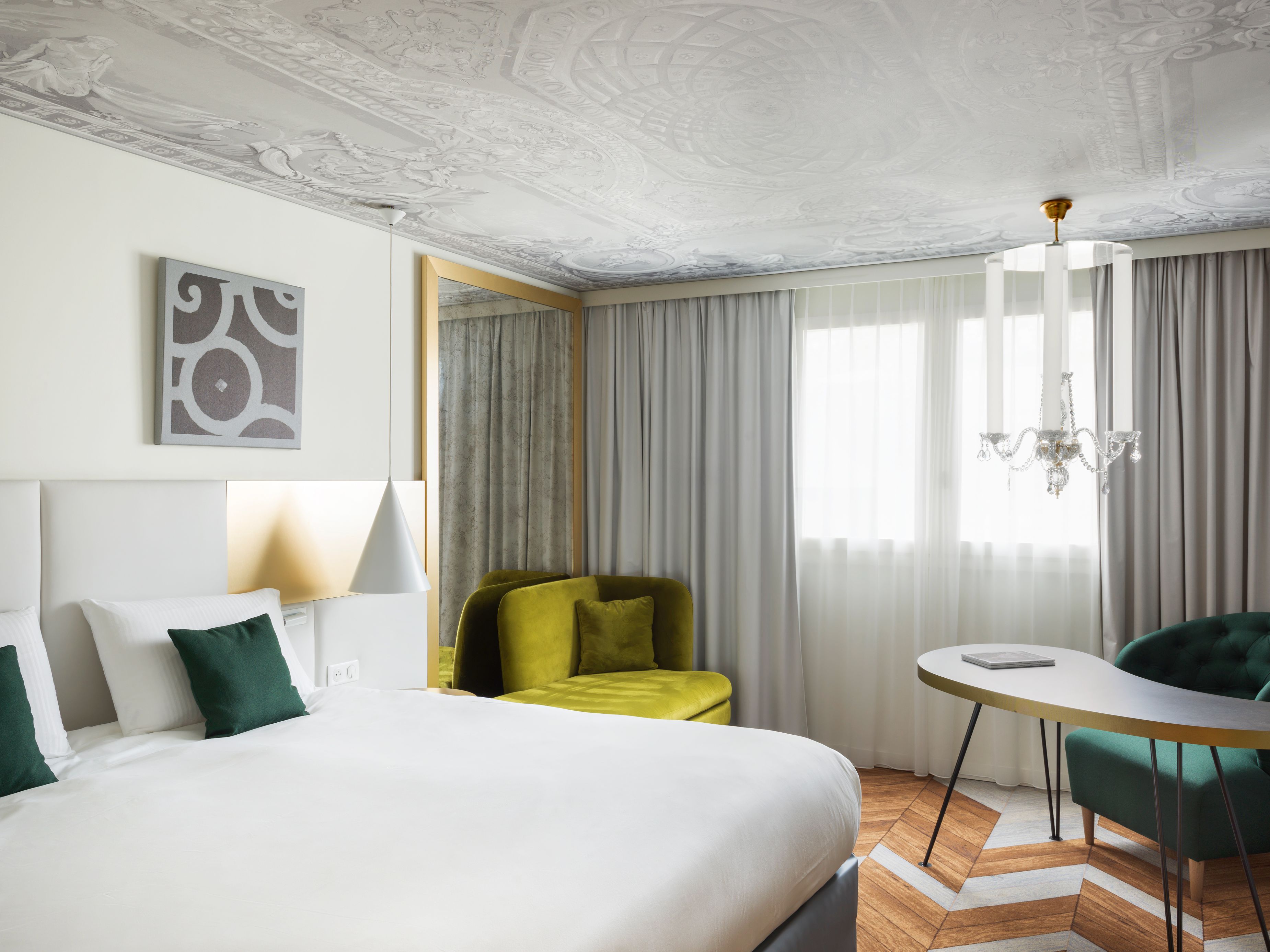 a room with a bed and a chair
