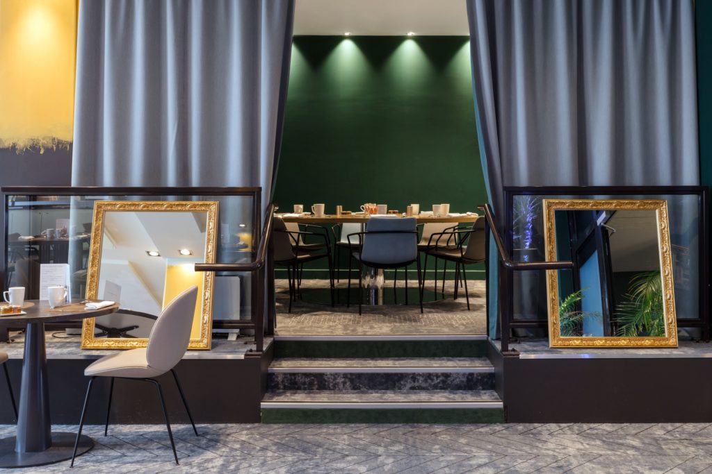 a room with a table and chairs