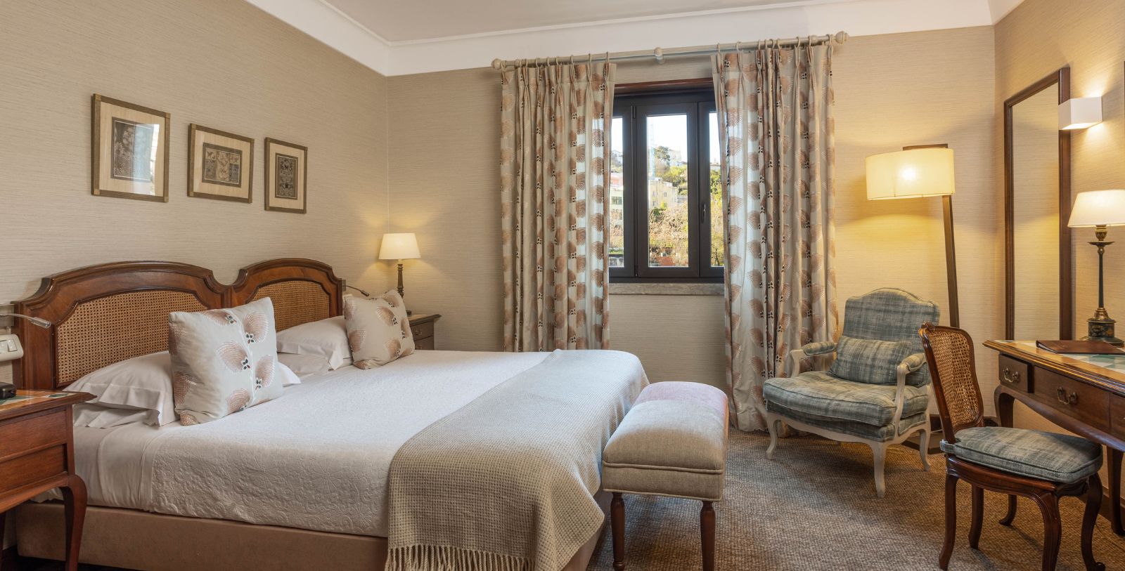 a bedroom with a bed and a chair