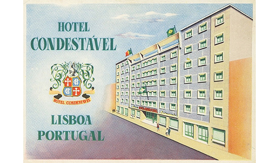 a sign with a building and text