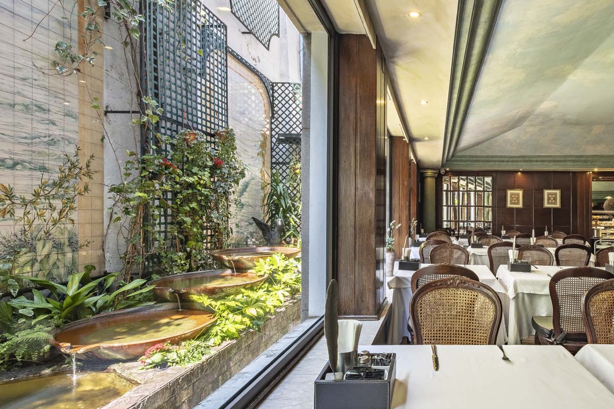 a room with tables and chairs